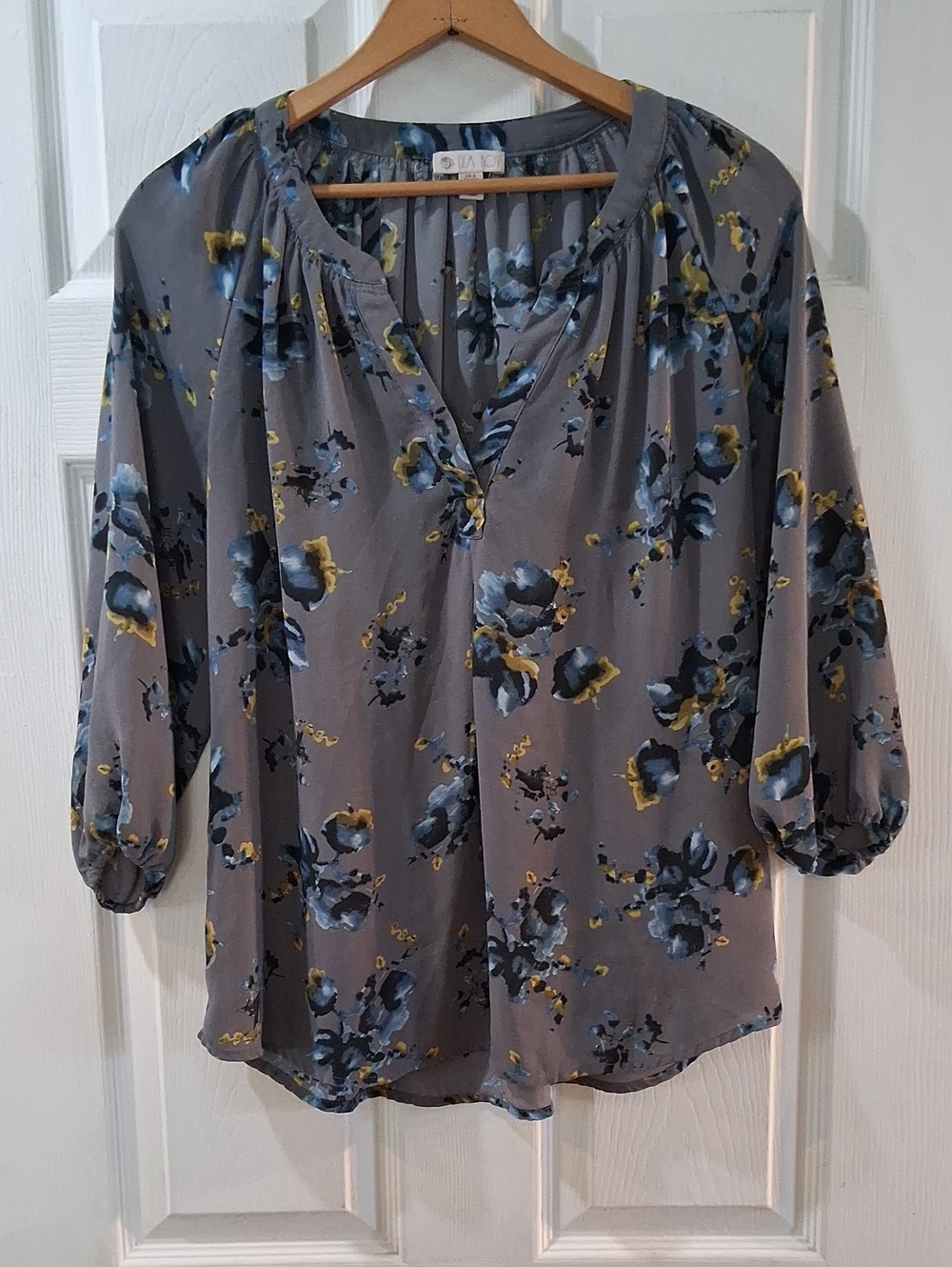 Lila Rose Gray Floral V-Neck Peasant Blouse with Blue and Yellow Accents